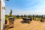 Large deck for outdoor dining and grilling